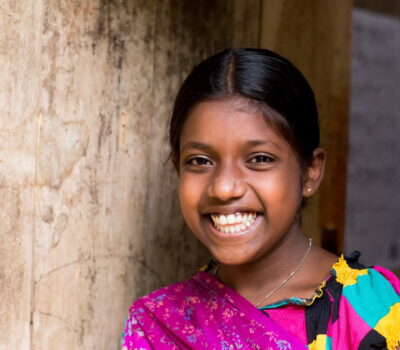 Exciba, 13, is a sponsored child from Southern Sri Lanka. With parents that work for a tea plantation, her future looked grim. Most children of tea workers end up with little or no education. Through child sponsorship, the community has seen many children learn through the learning centre World Vision implanted in their community, and parents are more aware of their childrens options and their rights. For Exciba and her family, things changed dramatically. When her parents saw the brilliance in their daughter, they not only supported her in the community school, but dared to dream and support her to apply at a national school. When she was accepted, her parents decided to leave the (free acco-modation / part of the salary terms) one room shack they had lived in and rent a more substantial home. The whole family have a sense of pride.